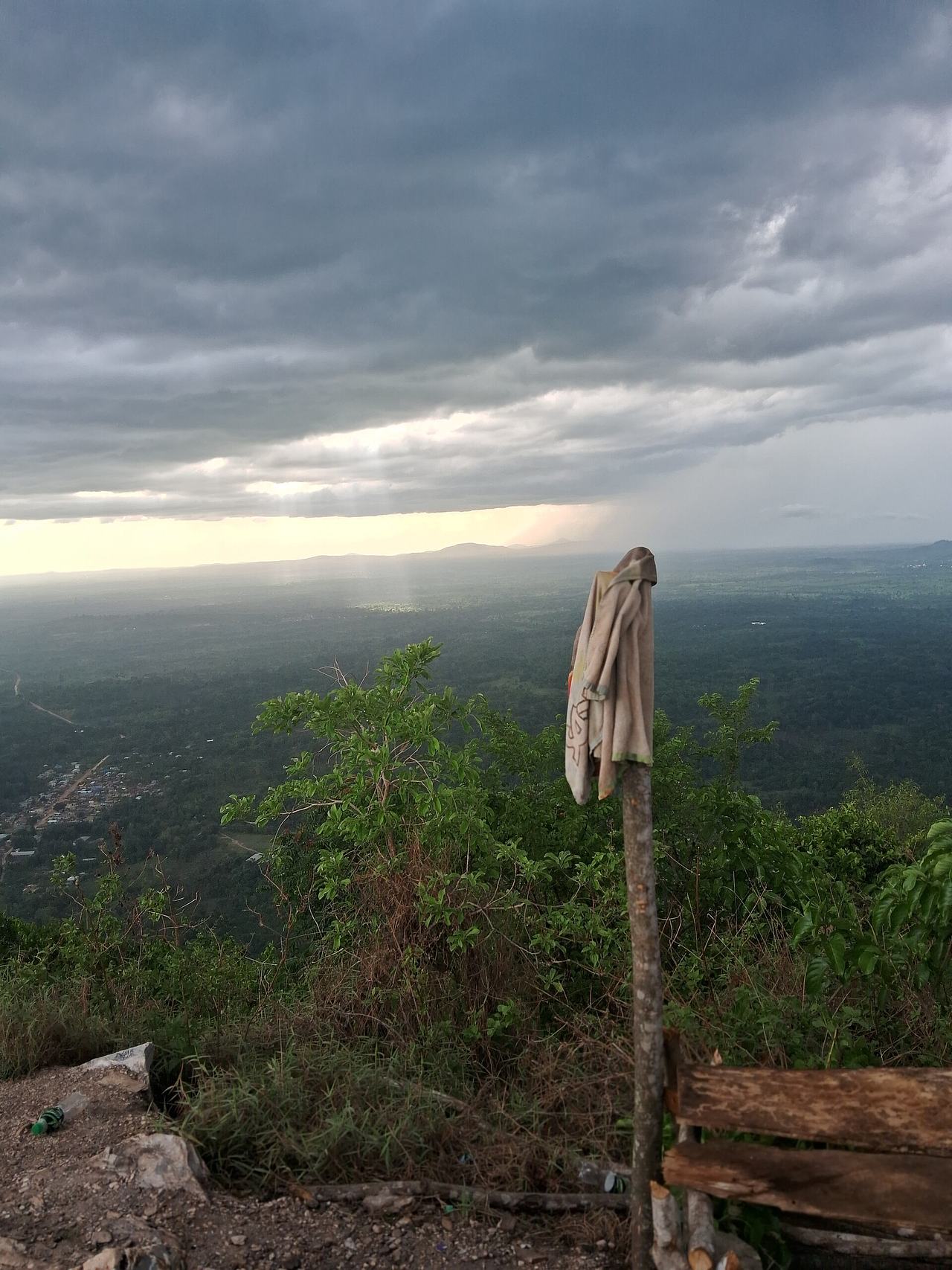 This picture was taken from the top of Mt Afadjato in the mid afternoon. The sky had gotten cloudy and it looked like it would rain. The picture reflects a beautiful view of Ghana that is not always afforded. Everything looks peaceful and tranquil...