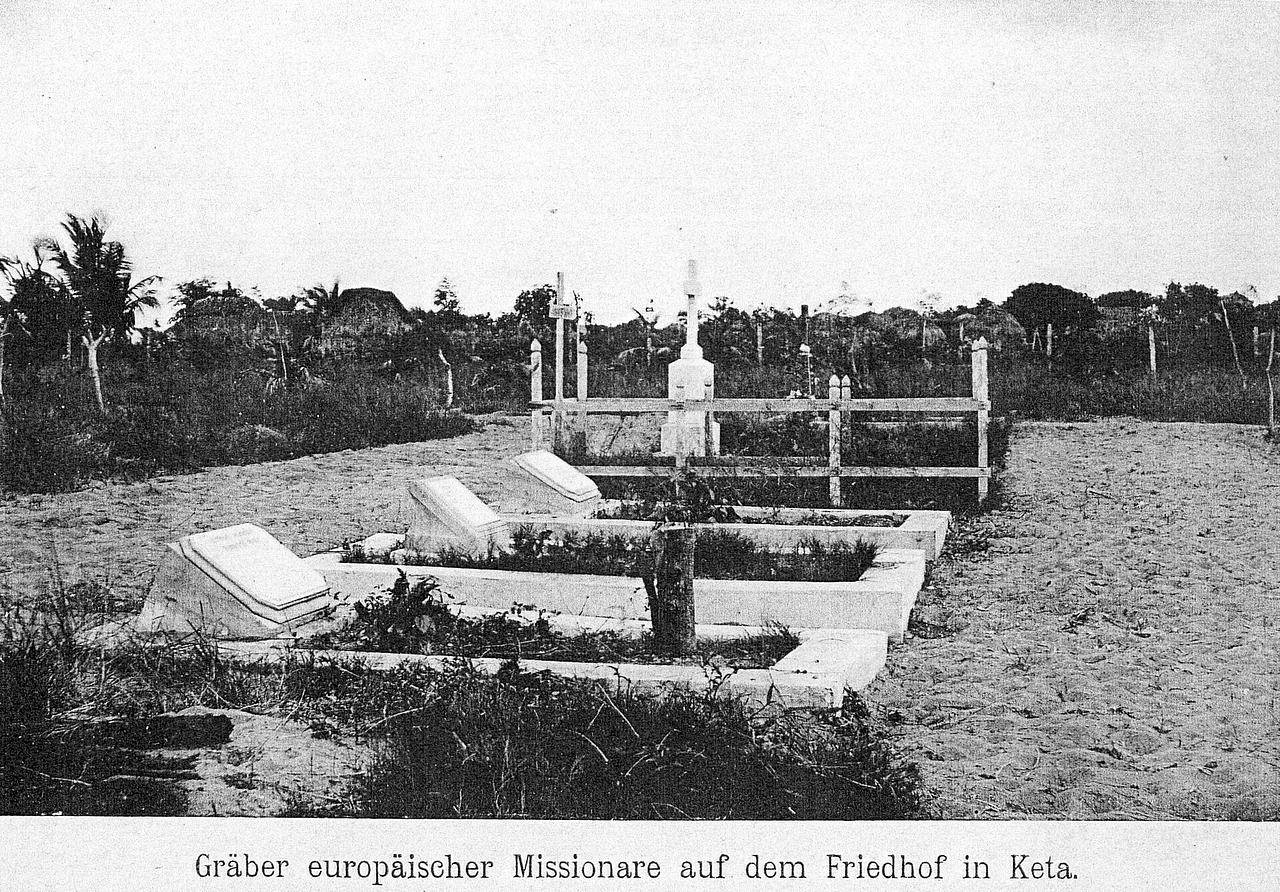 Original caption: European missionaries graves in the cemetery at Keta