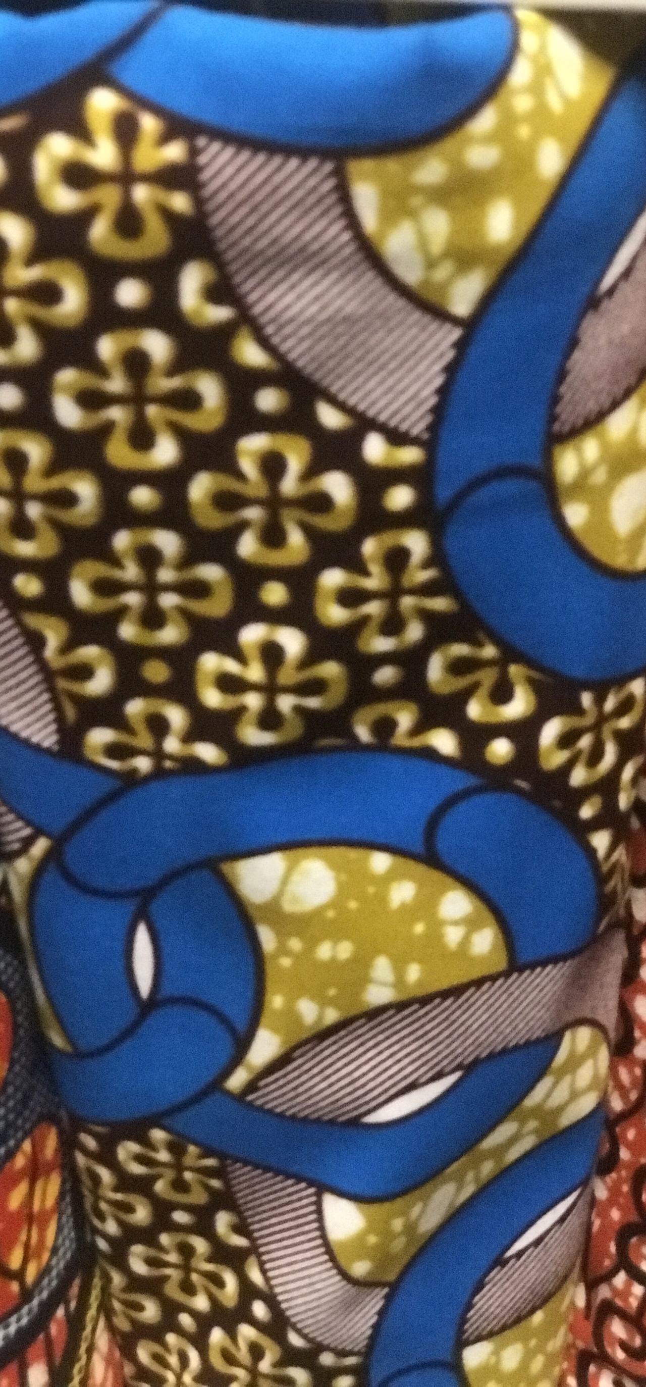 This fabric is a wax print found on the African fabric markets. It is also known by the name Olympia, however the Ghanaian Akan given name is the most popular name by which it it known.