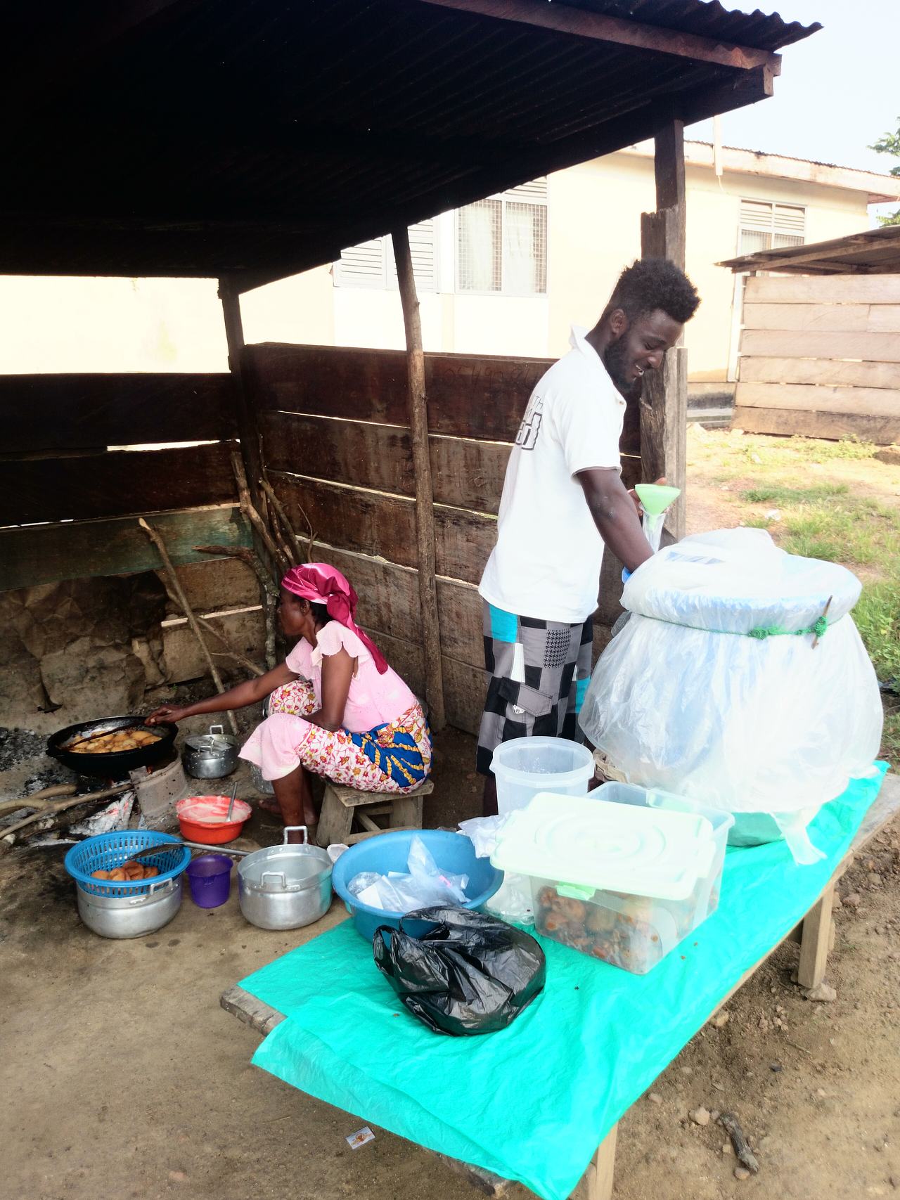Hausa Koko seller serving.