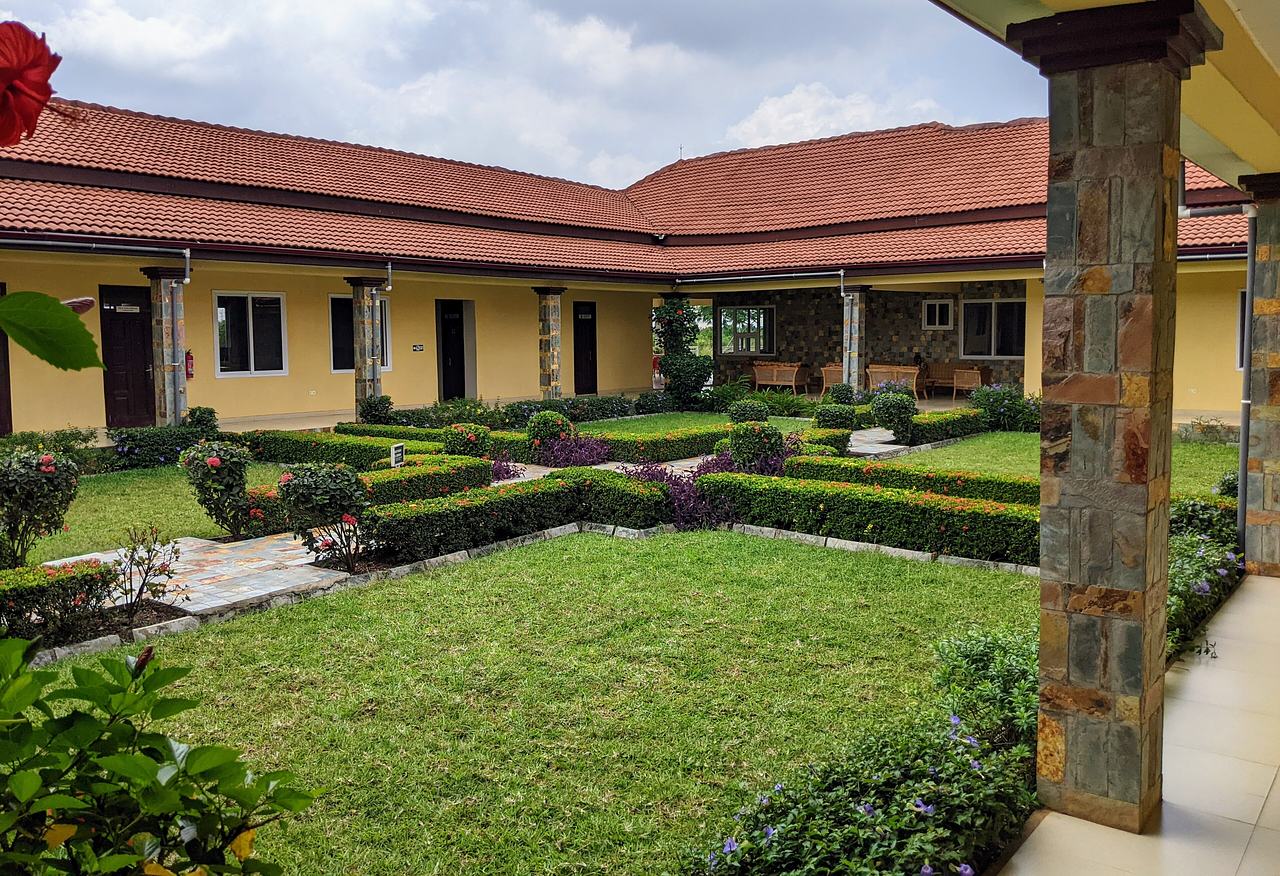 Palm Institute courtyard from one corner toward kitchen