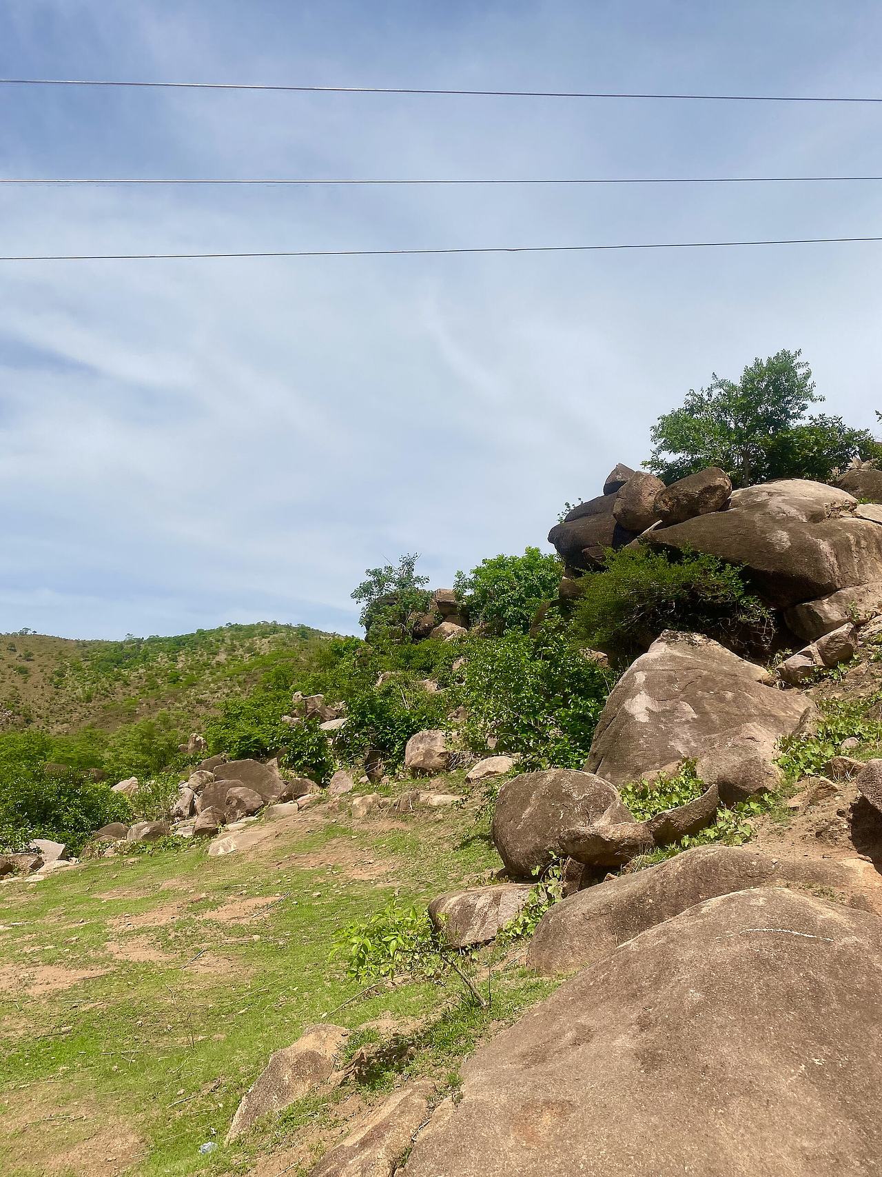 An image of some rocks found on a hill