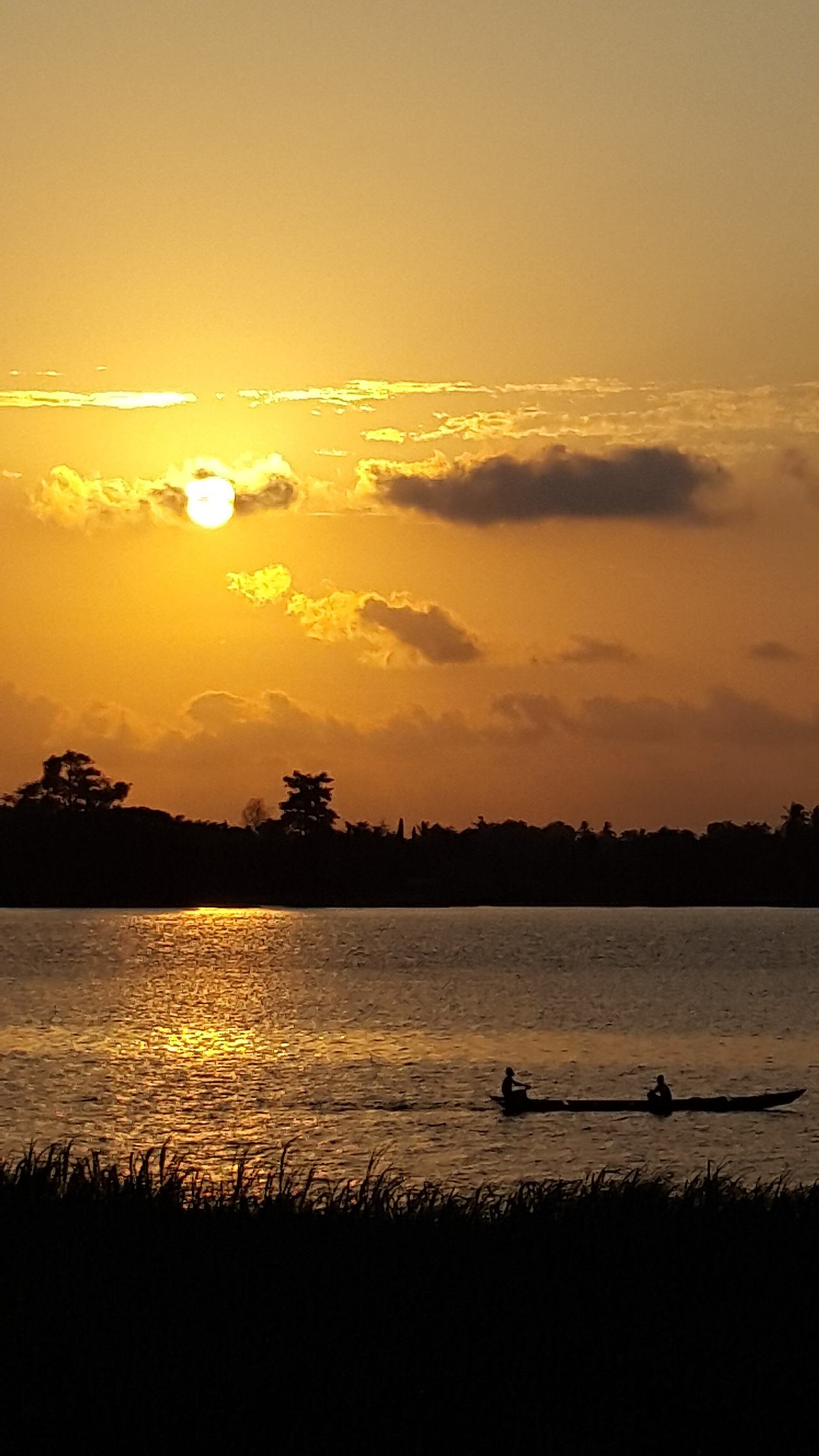 The Lower portion of the Volta Lake as it travels towards the estuary to join the Atlantic Ocean, passing by Sogakope and Fievie in the Volta Region of Ghana