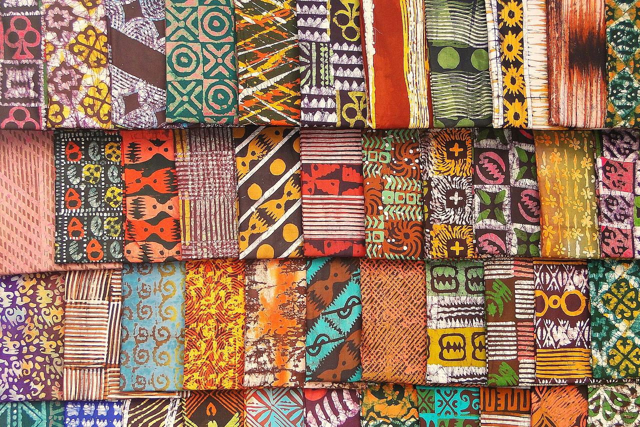 Original caption: "Kente (Batik) Cloth in Market - Kumasi - Ghana" Ankara textiles (Batik textiles) (no Kente) on the Kejetia Market in Kumasi, Ashanti Region, Ghana