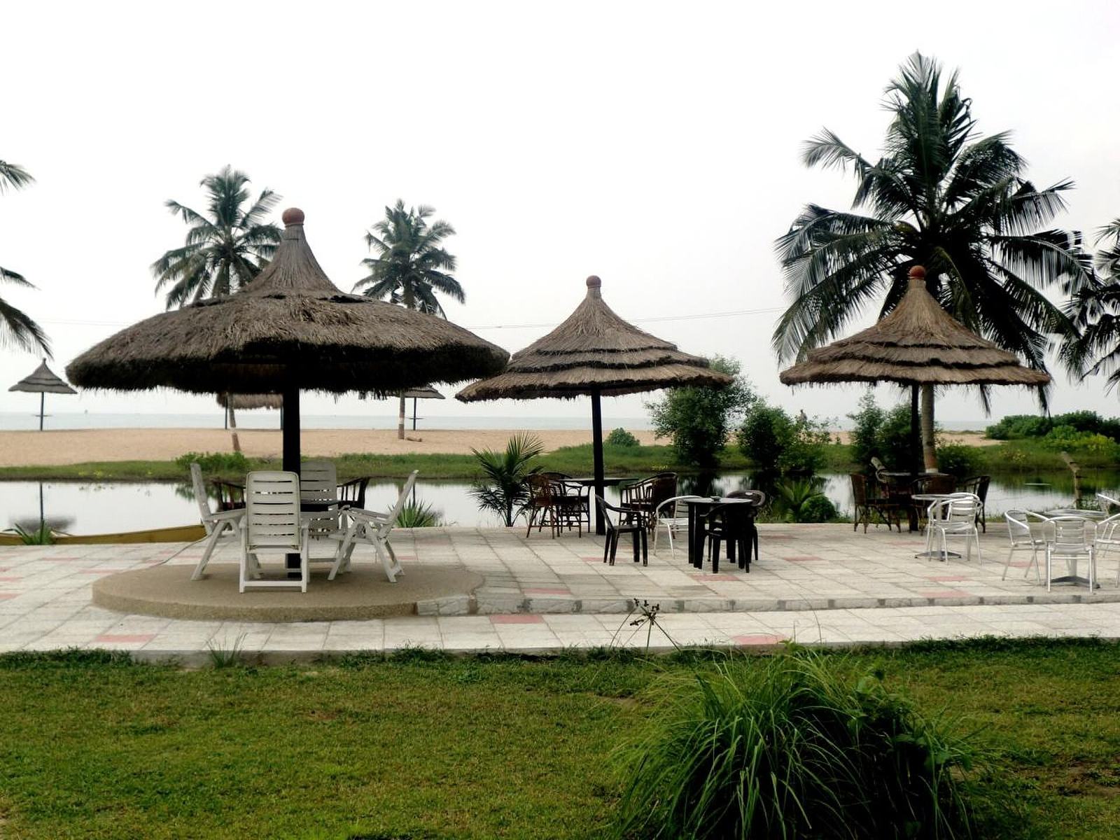Beachfront setting of Busua Beach Resort on the Western Region coastline of Ghana.