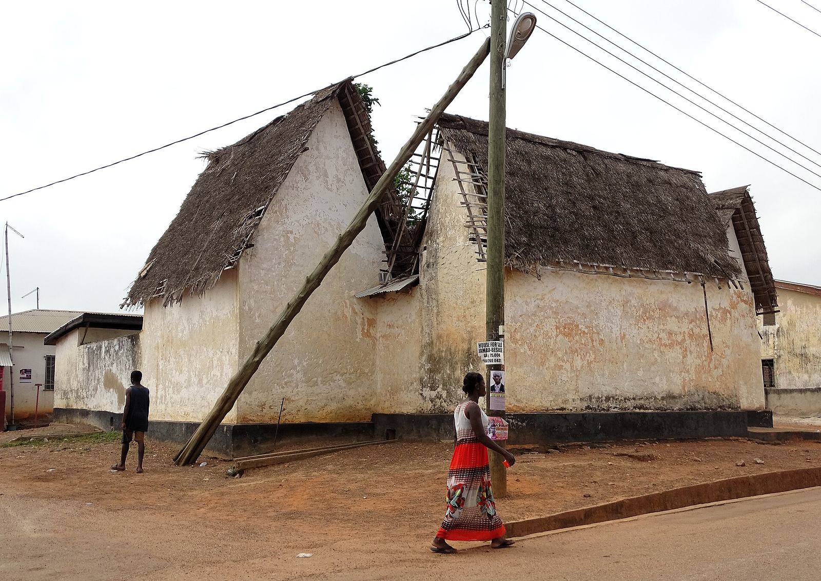 Traditional Asante shrine building at Besease, Ejisu, with earthen walls and courtyard layout.