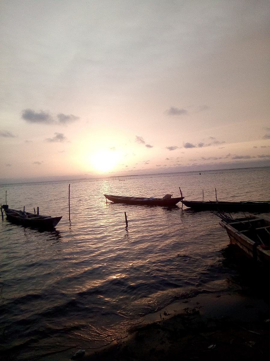 Keta Lagoon and Canoes at Sunset