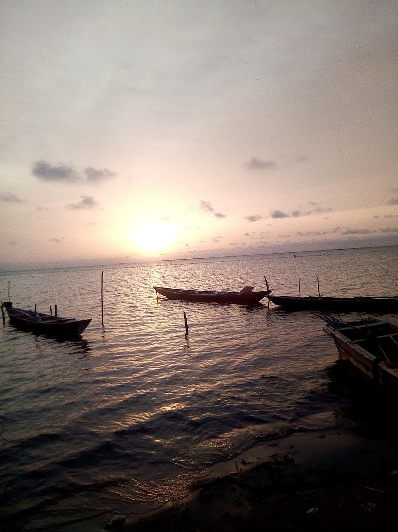 Keta Lagoon and Canoes at Sunset