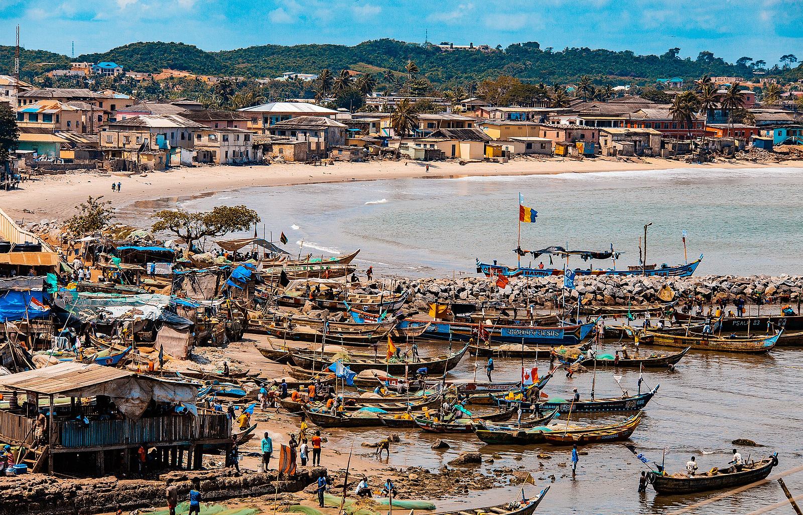 Fishing boats returning to the shore at Elmina, Ghana