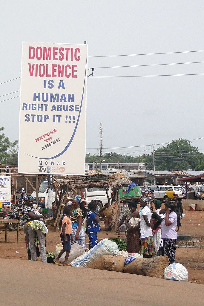 Domestic Violence is a Human Right Abuse - Street Sign with Market Women - Bolgatanga - Ghana