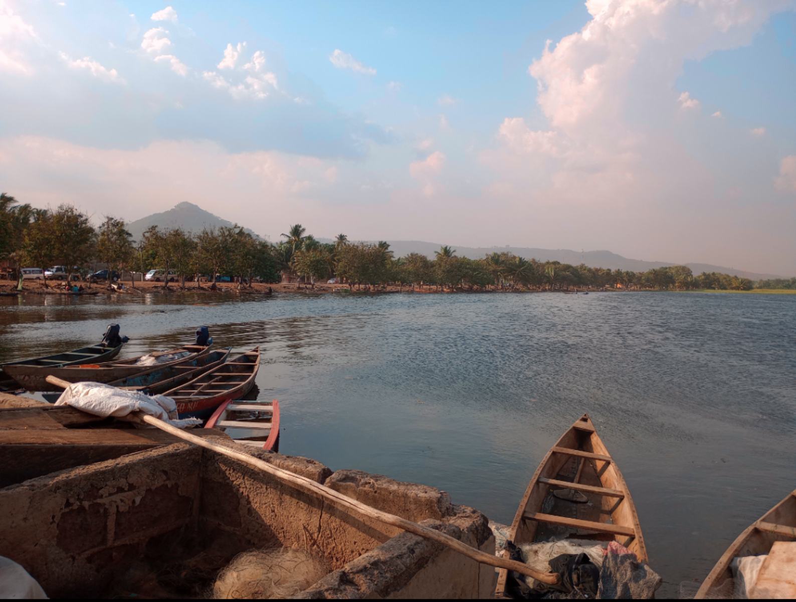 Canoes moored on the Volta Lake beside the Kpong Torkor fish market in Ghana.