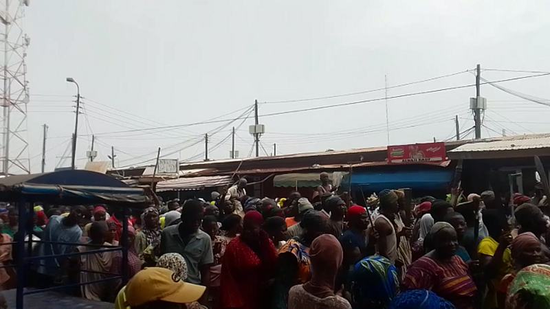 Tuutinli Tindana Entering Tamale Central Market