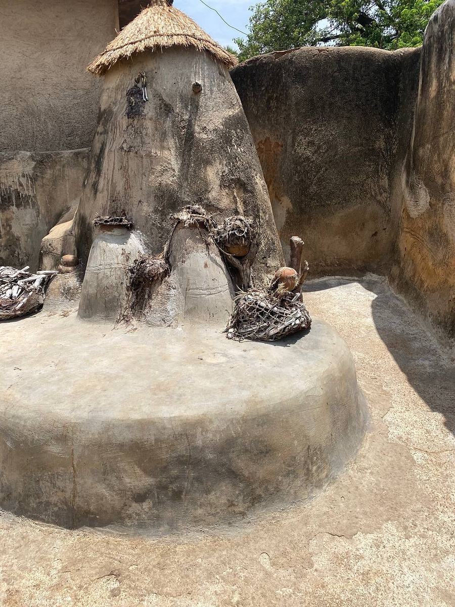 Indigenous mud shrine with ritual artifacts at Tongo Palace, Tongo Hills, Ghana
